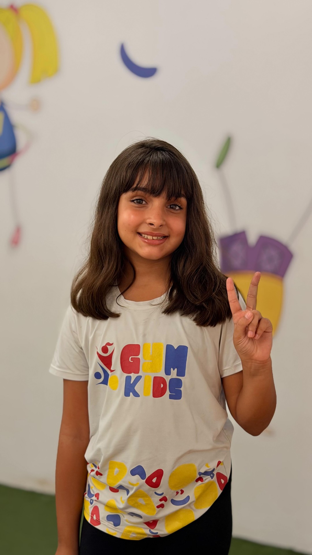 Reels da Gym Kids — aluna sorrindo